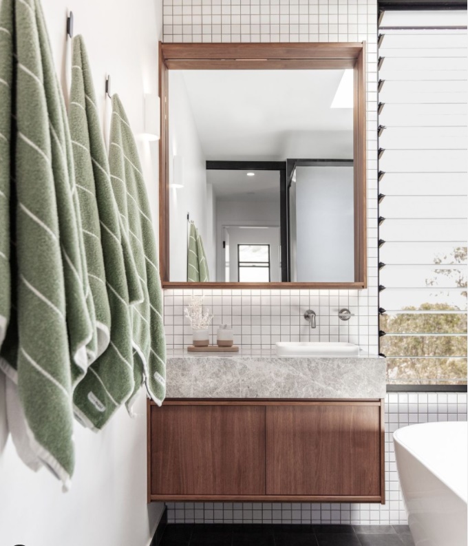 athroom with floating cabinets