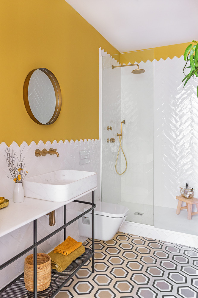 yellow wall small bathroom